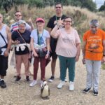 photo de groupe avec un manchot